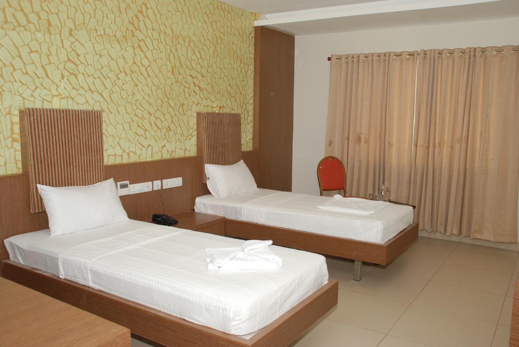 Hotel Pla Amrith Inn Tiruchirappalli Quarto foto